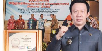 Sekdaprov Lampung Raih Penghargaan ASKOMPSI Digital Leadership Government Award 2025