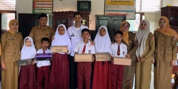 SPPG Hafizh Berkah Jaya Salurkan Bantuan Sepatu Sekolah